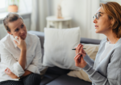 Two women having a profound coaching conversation.