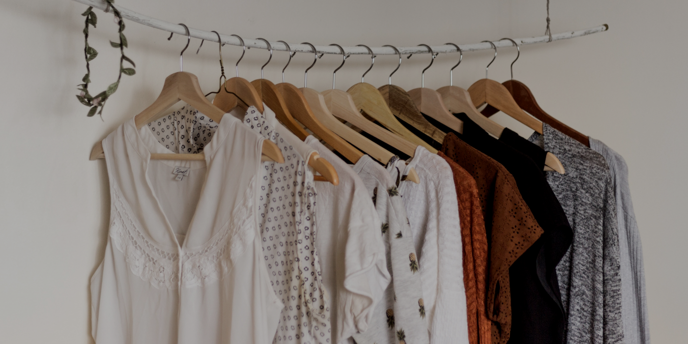 A clothes rail with women's clothes: What to wear to a 2-day event