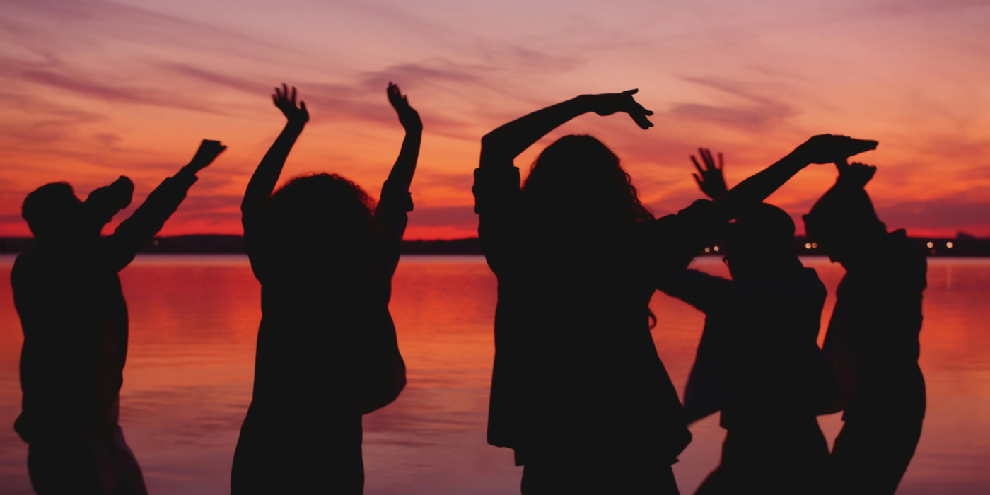 Silhouette of women dancing