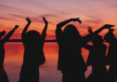 Silhouette of women dancing