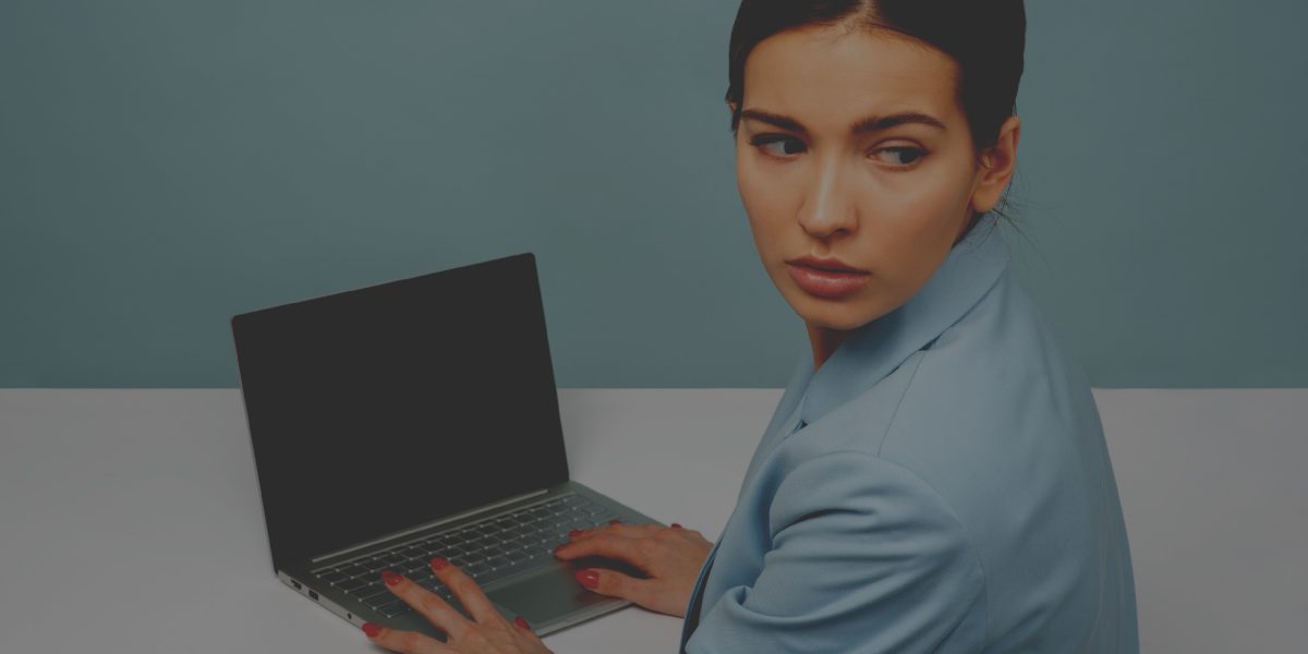 Woman at computer: What procrastination means