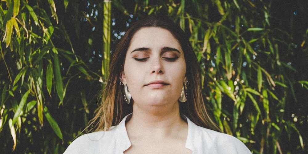 Woman with eyes closed. Mindfulness: where to start